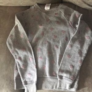 Girls sweatshirt with glittery hearts.